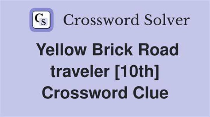 Dog on the yellow brick road Crossword Clue