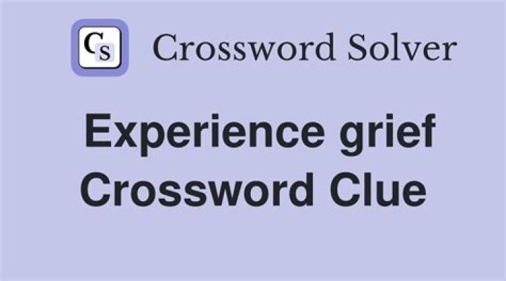 Experiencing the first stage of grief, say Crossword Clue