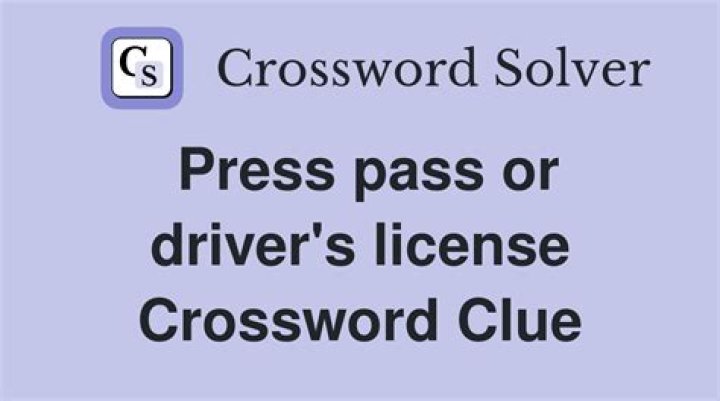 Sit beside a driver Crossword Clue